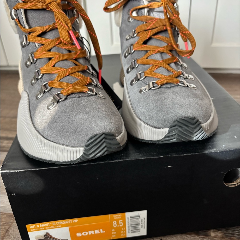 Sorel women’s Gray and Orange boots